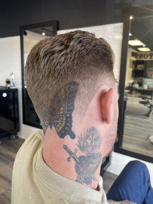 A neck taper done by barber Andrew