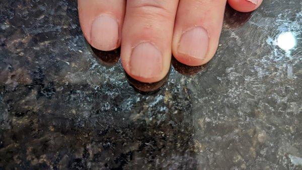 These again, WERE the long, beautiful nails that just needed the cuticles cleaned up, gentle shape & polish. Now a mess.