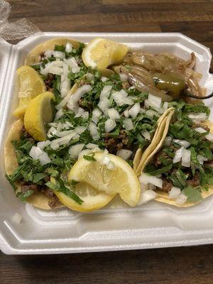 Lemons, grilled onions and a jalapeño, the trifecta of street tacos!