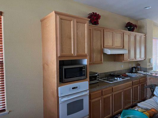 Transforming your kitchen cabinets with expert care. Redwood Coast Painting - Quality You Trust.