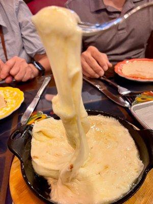 Fundido, mix of different cheeses served with tortillas. This was fun to eat.