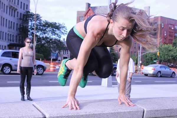 Instructor Nikkie Zanevsky practices her monkey vault (c) Ritza Francois.