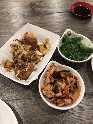 Takoyaki, seaweed salad and squid salad