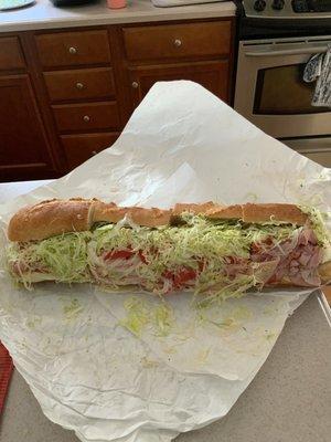 Now that's a sub!! Packed to the gills with meat, this Italian sub was HUGE!