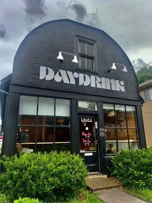 DAYDRINK is housed in a historic 19th century era building formerly home to one of Iowa City's first grocery stores.