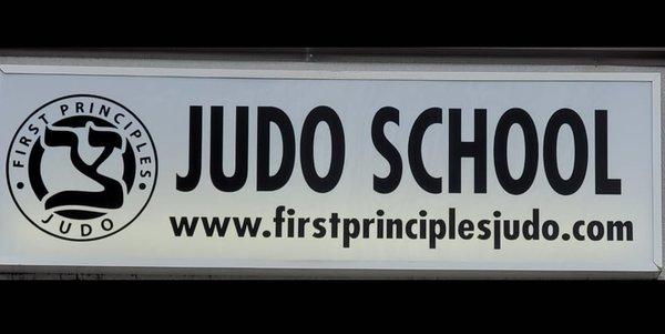 A picture of the judo sign outside of the school.