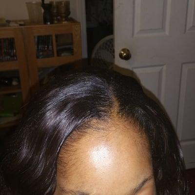 Stylist on the go Sew in with a natural part