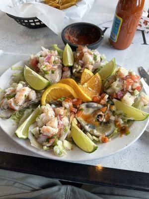 Six oysters on the half shell with shrimp ceviche. Yum!