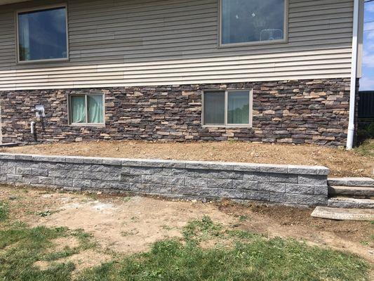 Stone veneer and versa block retaining wall