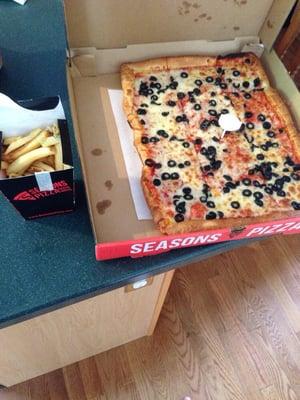 square black Olive pizza with French fries:)