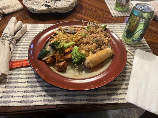 Szechuan tofu w/ vegetables, vegetable lo mein, vegetable fried rice, and vegetable spring roll.