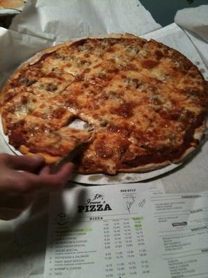 Extra large sausage and extra cheese pizza