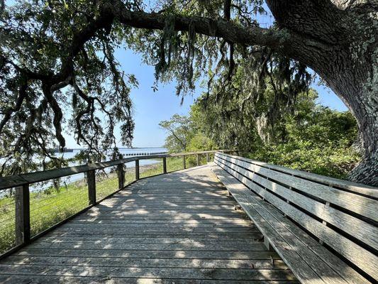 Path and sitting area near river