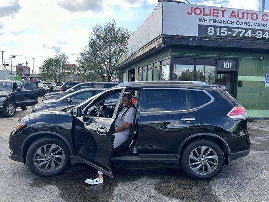 Our client with her new 2016 Nissan Rogue with 64k miles with $0 Down. Amazing!