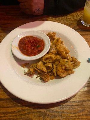 Start of with fried calamari appetizer