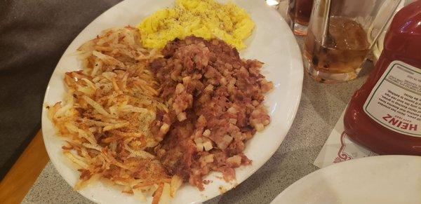 3 scrambled eggs, hash and hash browns.  Doubly delicious!