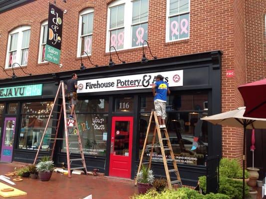 Putting up the sign at the new location. 116 S Main St., Mt Airy, MD.