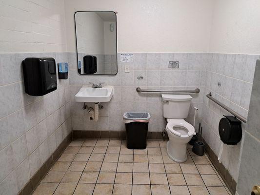 Inside the spacious handicap-accessible women's restroom