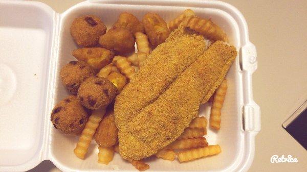 Catfish basket with fries and 1/2 hush puppies 1/2 corn fritters or corn bites whatever you're calling them...they're so good either way!!