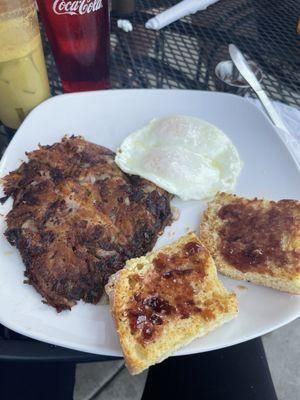 Corned beef hash with and biscuit on the side