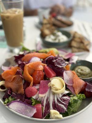 Blue lavender salad with smoked salmon. Iced vanilla latte and labneh-honey dip.