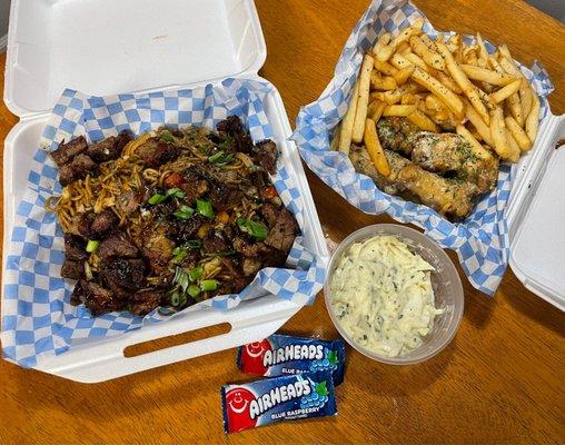 Brisket Yakisoba, garlic parmesan wings, with a side of fries and coleslaw.