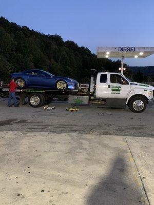 Ferrari on flatbed wrecker