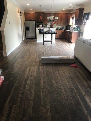 Flooring done on the whole bottom floor of our house