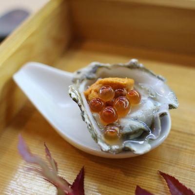 Kumamoto oyster topped with uni and ikura