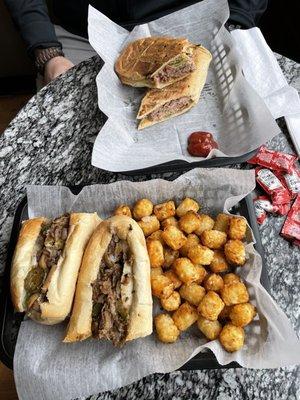 Cheese steak sub, Cuban sub and tots as a side