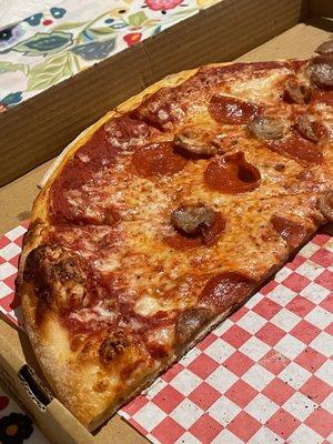 Hand tossed with pepperoni and sausage.