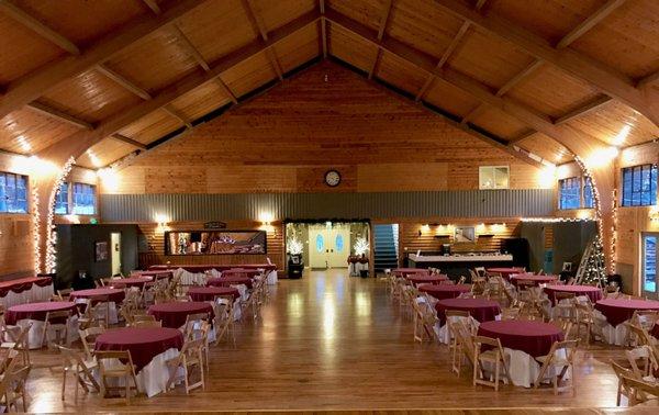 The Pinecrest Event Center. Beautiful hardwood floors ,surrounded with knotty pine walls and high vaulted ceiling.