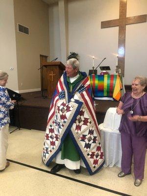 Pastor Jerry getting his Quilt of Valor for his AF service