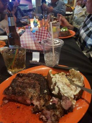 Rib eye and baked potatoe