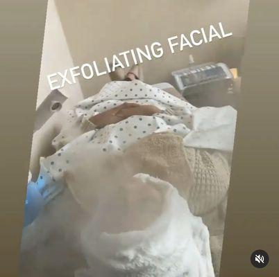 Exfoliating facial with light massage on face