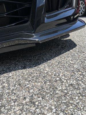 Drivers side front spoiler damage