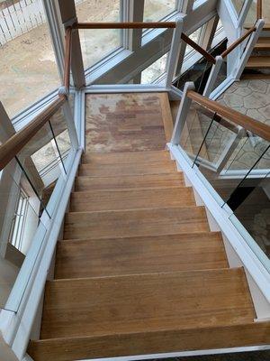 Stairs refinishing was not completed. The only thing they did was some half ass stain testing at the base WTF!