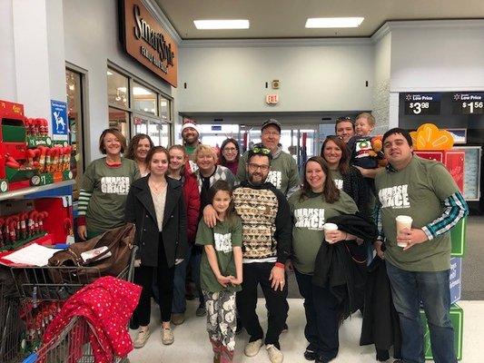 Awesome church family shopping for our neighborhood in need Christmas.