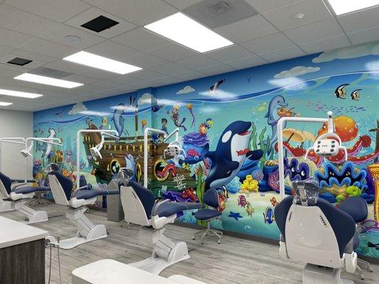 Aquatic themed children's dental clinic, (open bay area for cleanings and check ups)