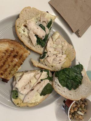 Alleged CHICKEN PESTO sandwich  grilled chicken, tomato, arugula, pesto* aioli, house vinaigrette, baguette