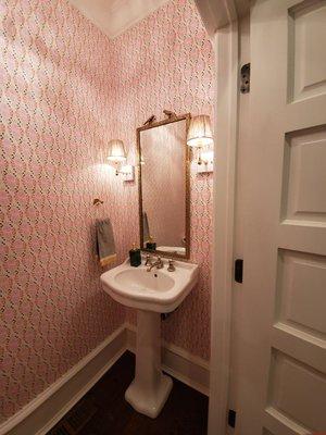 Cute wallpaper install for guest bathroom