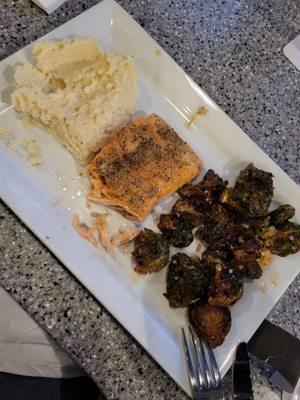 Salmon with mashed potatoes and Brussel sprouts are delicious