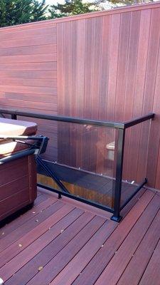 Privacy wall, deck, stairs, and glass railings by Jeremy at Elite Bay Area.