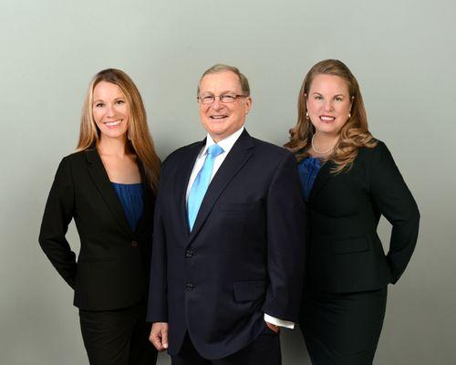 Attorneys Kristi Gourley, Mike Riddle, and Christine Butts