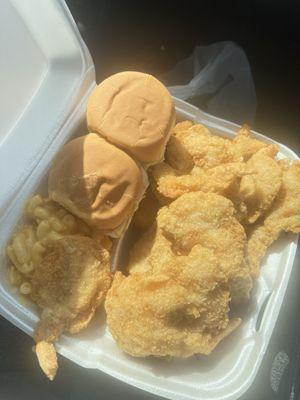 12 pieces shrimp with 2 sides (fried okra and Mac and cheese) rolls are included