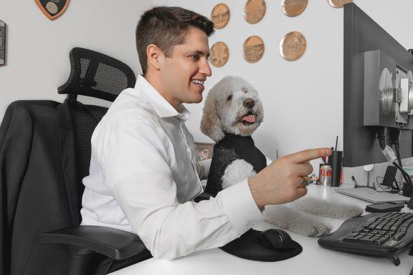 Adam with The Adam Glazer Team's Chief Puppy Officer, Scully.