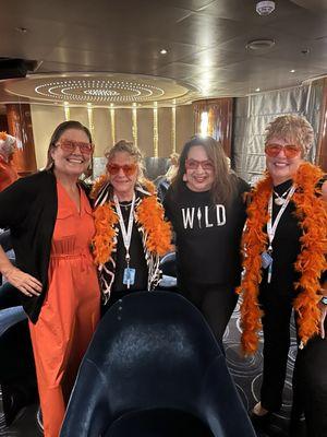 I'm wearing my WILD shirt from Woodlands at the Orange party on our ship!