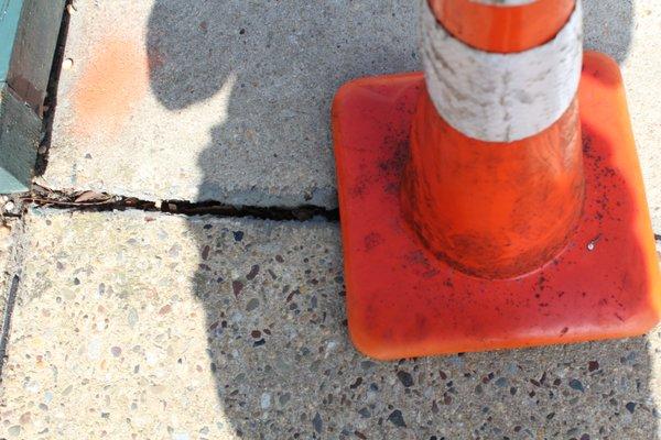 Close-up of sidewalk segment gap(s)