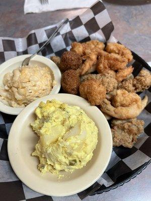 Three seafood combo with oysters, shrimp, and crab claws. The Mac & cheese is fantastic