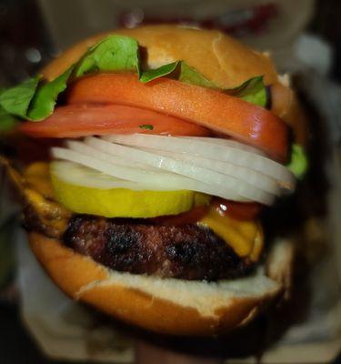 Cheeseburger on the softest bun , perfectly cooked juicy hamburger ,great CHAR! Fresh ingredients